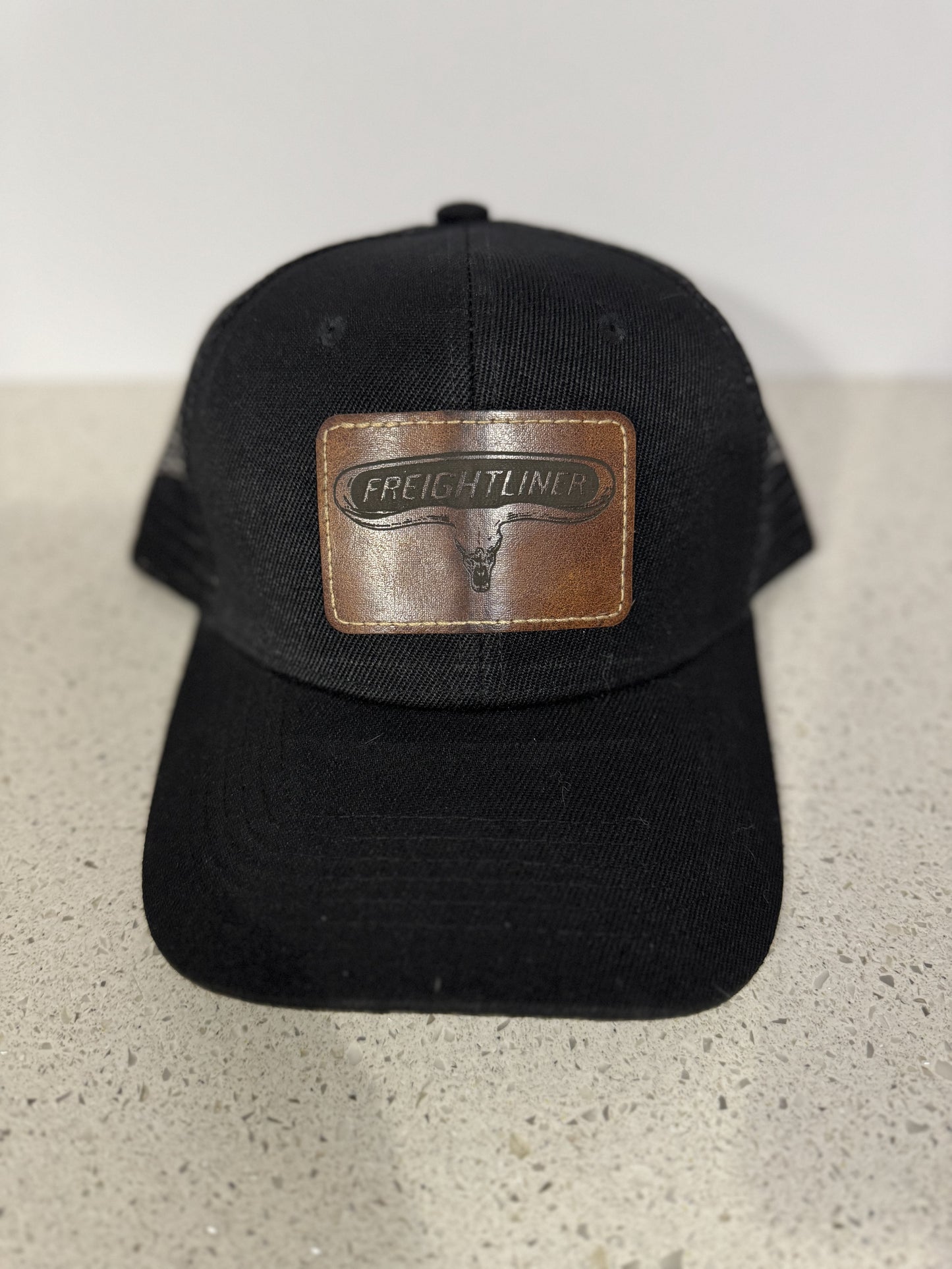 Laser engraved leather patched snap back hats - Freightliner