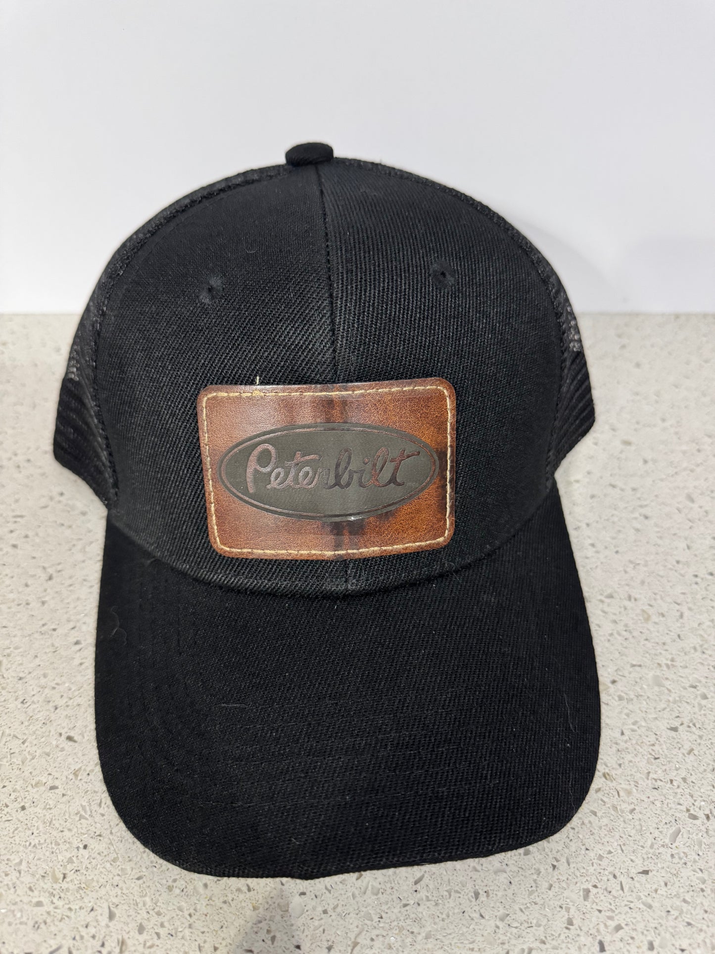 Laser engraved leather patched snap back hats - Peterbilt